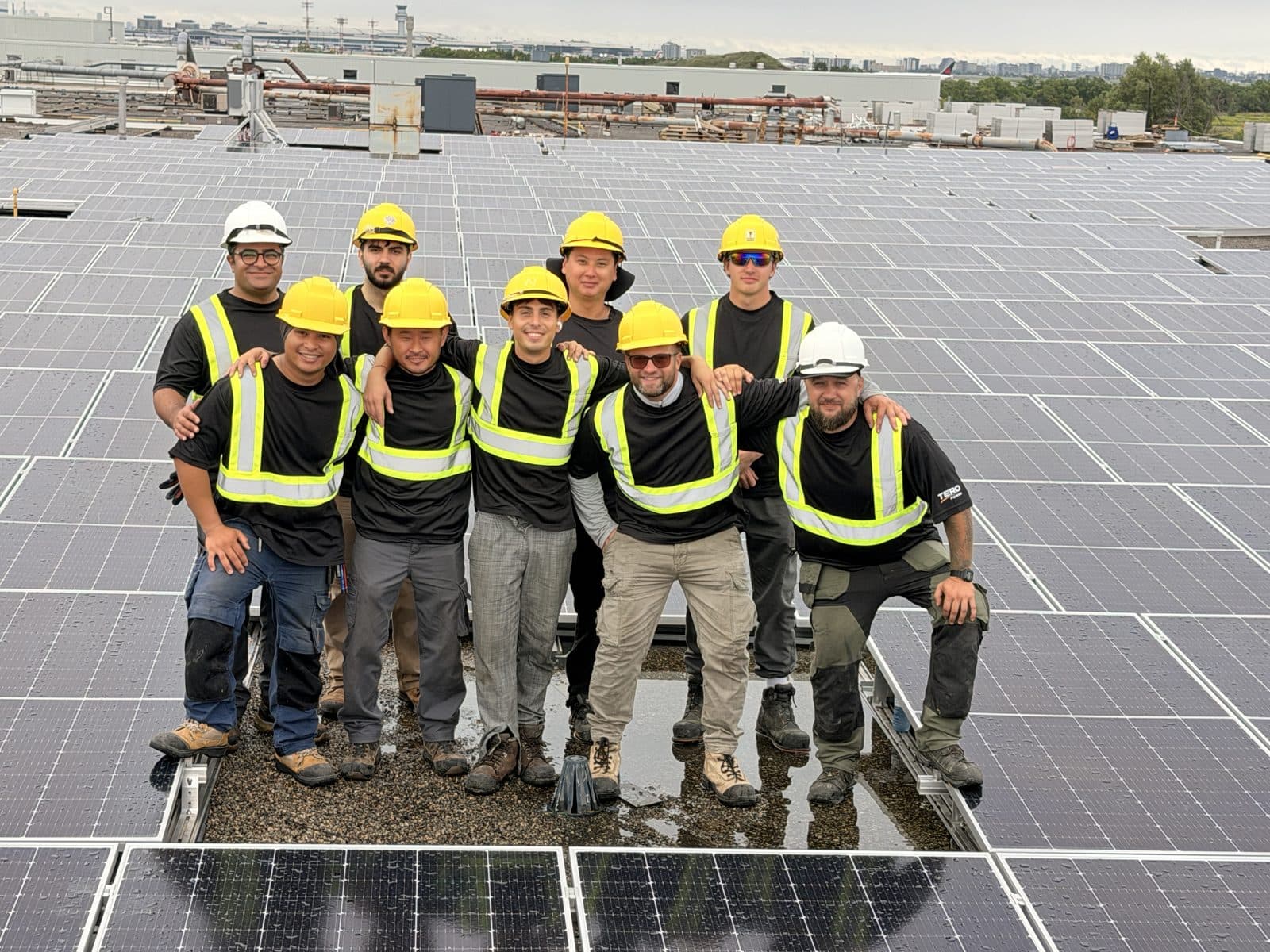 The Tero Power crew on a completed rooftop solar array in Mississauga