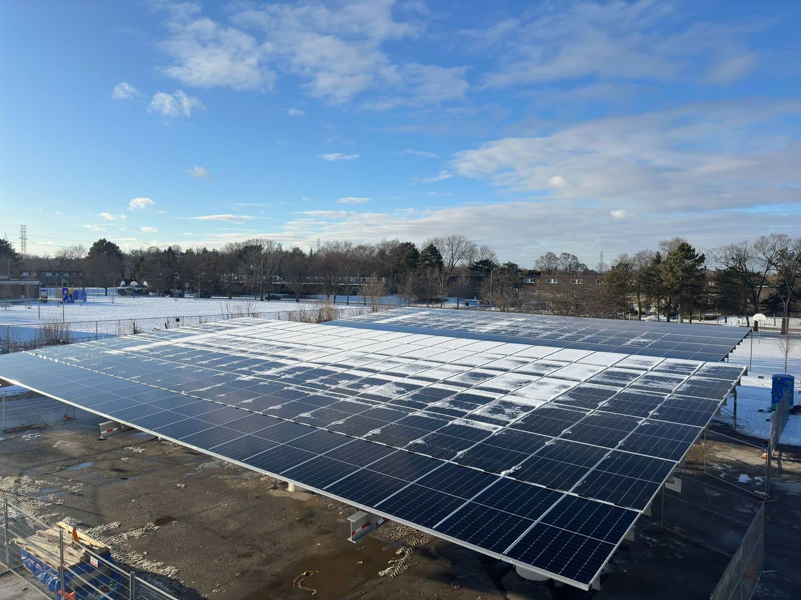 Completed solar carport at a Toronto Community Housing property in winter